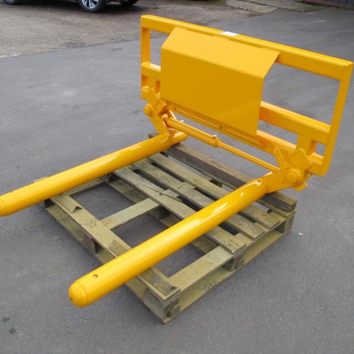 Murray Machinery Wrapped Bale Handler for handling and stacking wrapped round silage bales.